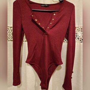 Burgundy Bodysuit With Gold Accents